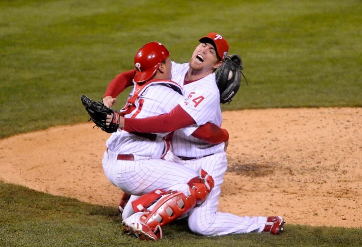 Philadelphia Phillies' Carlos Ruiz, left, and Brad Lidge react after the final out in Game 5 of the baseball World Series in Philadelphia, Wednesday, Oct. 29, 2008. The Phillies defeated the Tampa Bay Rays 4-3 to win the series.